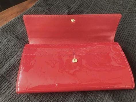 The quality of materials used in these. Louis Vuitton Sarah Wallet Red Monogram Vernis Leather ...
