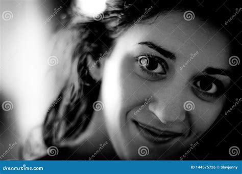 Portrait Of A Beautiful Brunette Enigmatic Smile Stock Photo Image