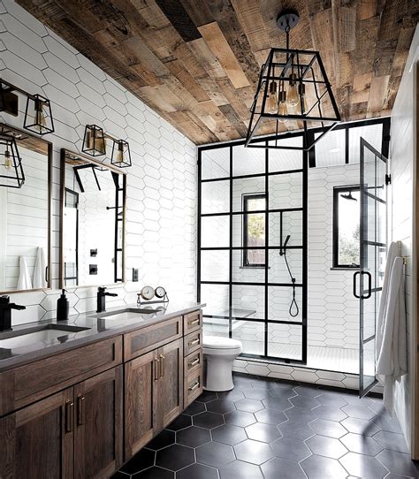 Wood Ceiling And Floor Along With Black Accents In The White Bathroom