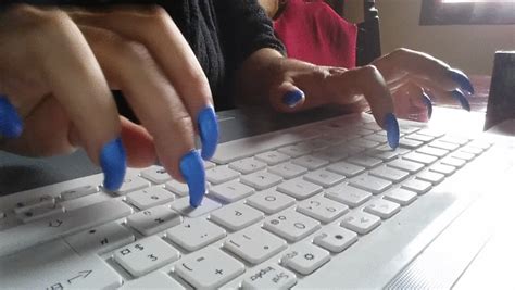 femme fetishist long finger nails tapping on keyboard