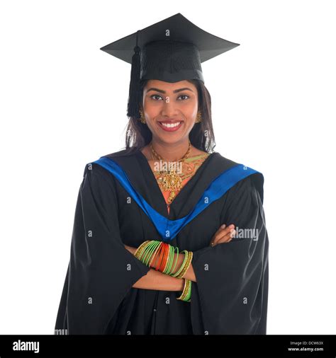 Happy Indian College Student In Graduation Gown And Cap Portrait Of