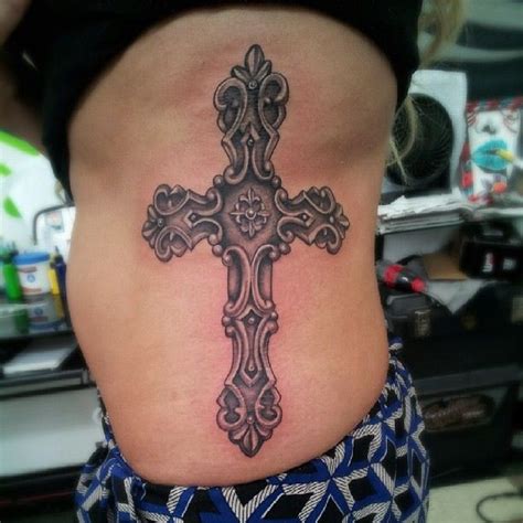 cross rib tattoo by lalo pena cross rib tattoos aztec tattoos aztec tattoo designs cross