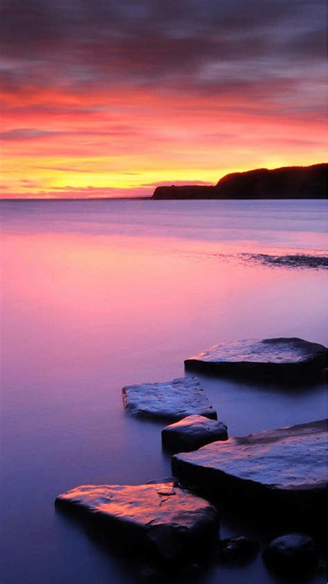 To set the image as your wallpaper, tap and hold to save it to your camera roll. Sunset on Beach with rocks Android wallpaper - Android HD wallpapers