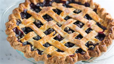 Mixed berry pie with homemade pie crust, blueberries, raspberries and blackberries bake together to make the most amazing berry pie you've ever tasted! How to Make Homemade Blueberry Pie - Easy Blueberry Pie ...