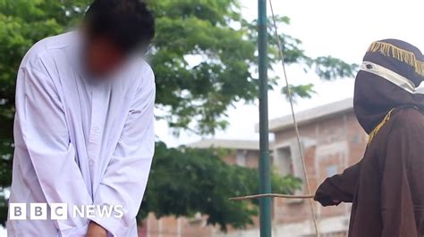gay couple publicly caned under indonesian region s sharia law bbc news
