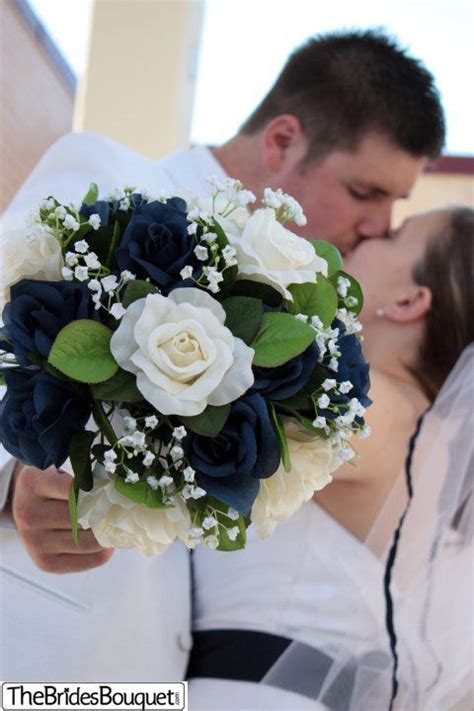 We have a variety of flowers to choose from that'll last forever. Navy Blue and Ivory Silk Rose Nosegay | Artificial Wedding ...