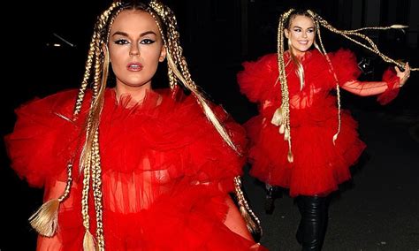 Tallia Storm Showcases Edgy Style In A Semi Sheer Red Dress As She