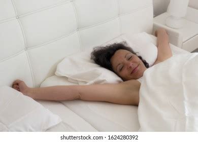 Girl Covering Face Hands Lying Bed Stock Photo Shutterstock