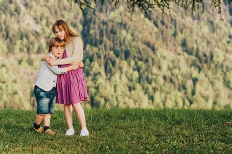 Little Boy And Girl Resting In Mountains Stock Image Image Of Brother