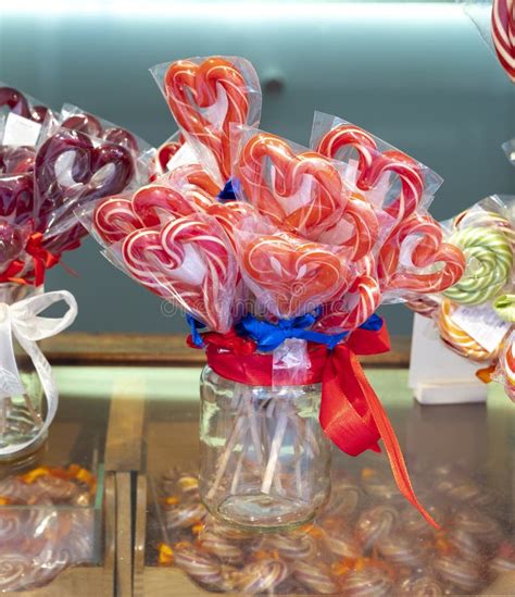 Colorful Heart Shaped Lollipops For Sale On Candy Shop On Happy