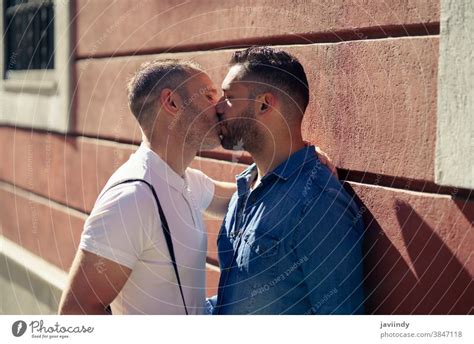 Gay Couple Kissing On Beach A Royalty Free Stock Photo From Photocase