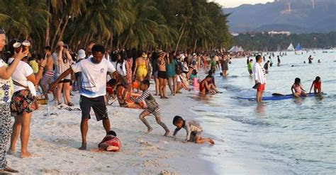 Tourists Enjoy Final Day At Beach Before Boracay Closure
