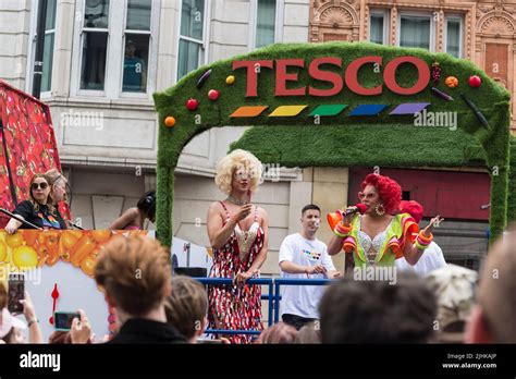 Men Dressed As Women In A Street Procession At London Pride Supported