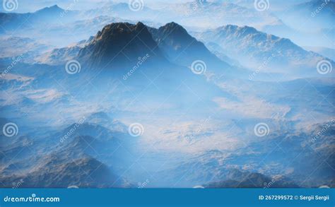 Distant Mountain Range And Thin Layer Of Fog On The Valleys Stock Photo
