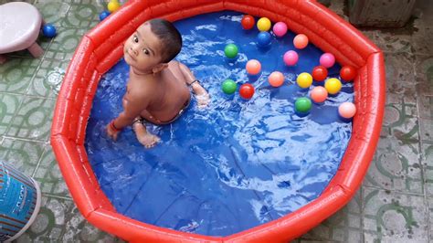 Cute Little Baby Playing In Water Tub With Color Balls Youtube