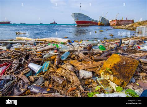 COLON, PANAMA - APRIL 15, 2015: Waste and pollution washing on the