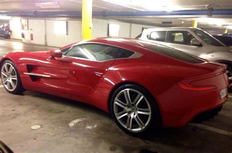 Bond — your new car has arrived. Red Aston Martin One-77 Spotted in Geneva