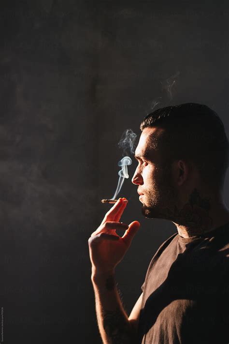 Portrait Of Man Smoking By Stocksy Contributor Susana Ram Rez Stocksy