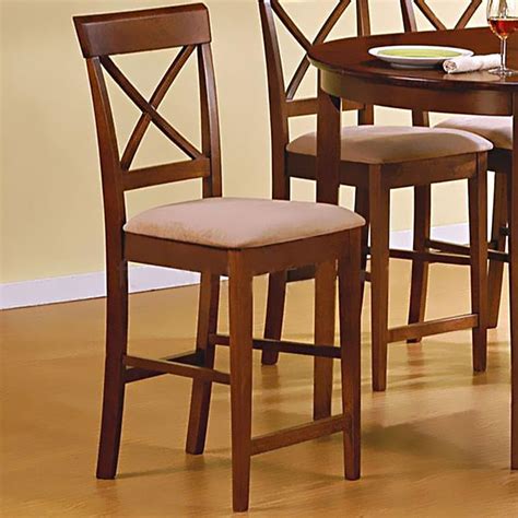 The round 360 degree swivel seat is upholstered in a beige fabric. Hyde Cross Back Counter Height Stool | Bar Stools | Bar stools, Coaster furniture, Stool
