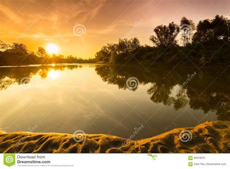 Panorama Of Wild River With Sunset Cloudy Sky Reflection In Autumn