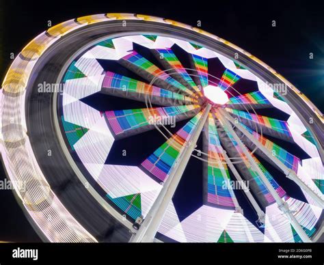 The Ferris Wheel At The Palma De Mallorca Fair Captured With The Long