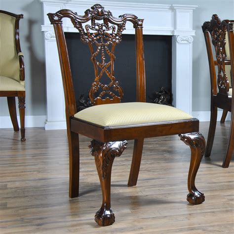 The chair is upholstered in gros point floral decoration. Carved Mahogany Chippendale Chairs, Set of 10, Niagara ...