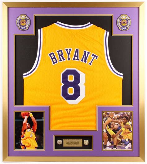 1996 was kobe bryant's draft year, as this jersey from bryant's rookie season is the lakers' classic blue alternate jersey, featuring a gold embroidered nba logo to celebrate the nba's 50th anniversary. Kobe Bryant Los Angeles Lakers 32x36 Custom Framed Jersey with Championship Rings