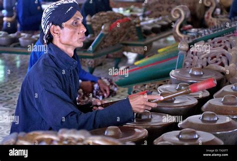Gamelan Musician Are Playing Their Instrument In Yogyakarta Palace