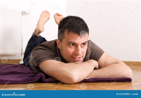Man Lying On Stomach On The Floor Stock Image Image Of Looking