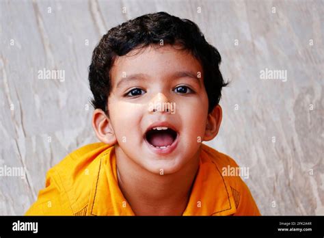 Three Year Age Indian Baby Boy In Yellow Shirt Close Up Stock Photo Alamy