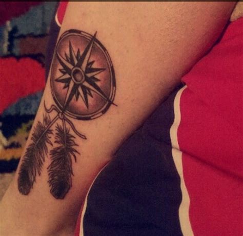 Compass With Eagle Feathers Tattoo Eagle Feather Tattoos Feather Tattoo Tasteful Tattoos