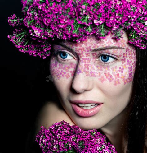 Close Up View Of Blue Eyed Woman With Flowers Stock Photo Image Of