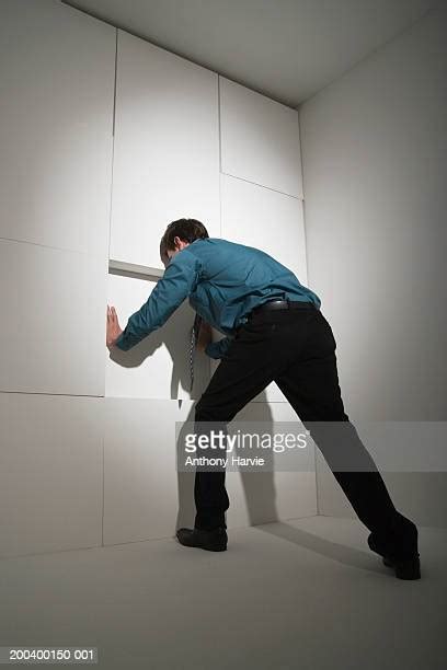 Pushing Against A Wall Photos And Premium High Res Pictures Getty Images