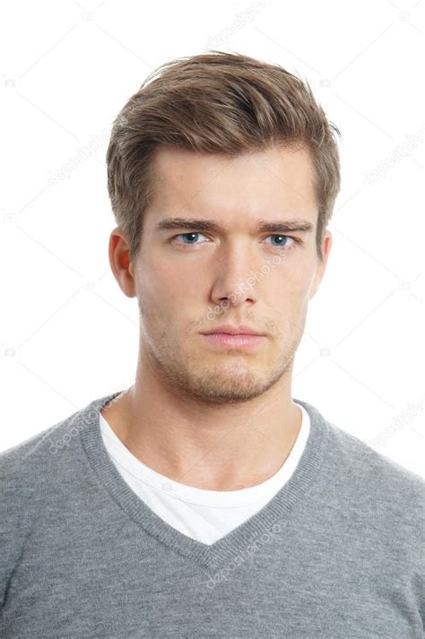 Young Man Looking Serious Stock Photo By ©buecax 44819147