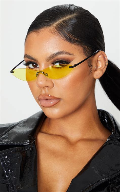 neon yellow tint frameless slim cat eye sunglasses prettylittlething