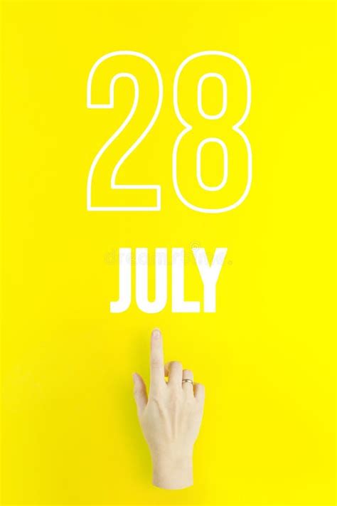 July 28th Day 28 Of Month Calendar Datehand Finger Pointing At A
