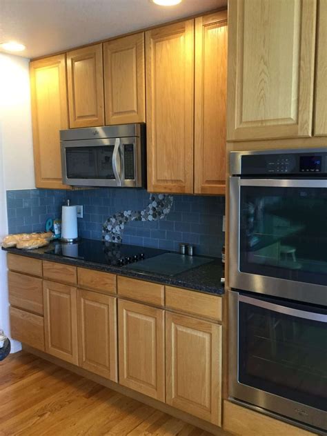 Combine equal parts vinegar and warm water in a spray bottle and spray the cabinets. Cleaning Kitchen Cabinets | Kitchen cabinet door styles ...