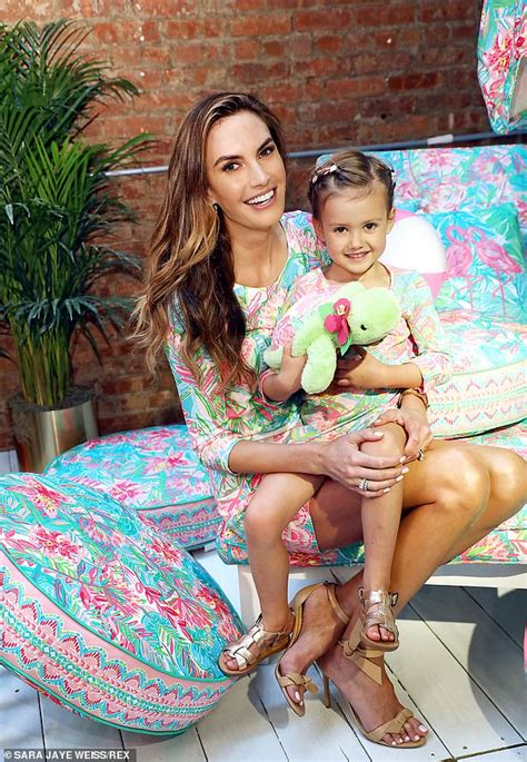 Armie Hammers Daughter Harper Cuddles Mom Elizabeth Chambers As The