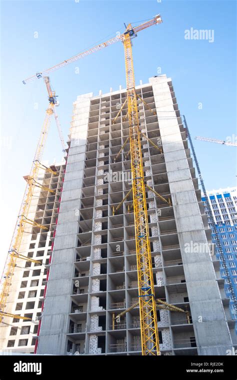 Building A Skyscraper With A Crane Construction Of High Rise Building