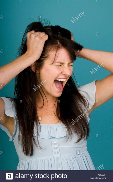 Woman Screaming Pulling Hair Out High Resolution Stock Photography And