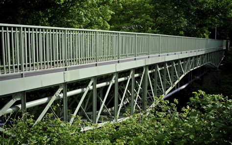 Restored Bridge At Taffs Well This Footbridge Over The Riv Flickr