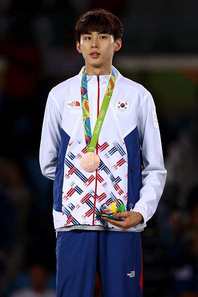 Bronze Medalist Taehun Kim Of Korea Stands On The Podium During The