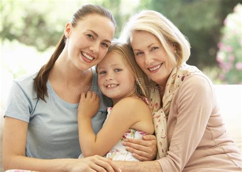 Grandmother With Daughter And Granddaughter Laughing Together On Sofa Sexiezpix Web Porn