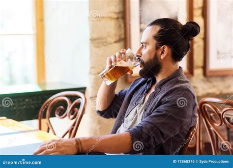 Happy Man Drinking Beer At Bar Or Pub Stock Photo Image Of Drinking