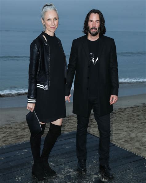 Photo Keanu Reeves et sa compagne Alexandra Grant Photocall Saint Laurent présente sa