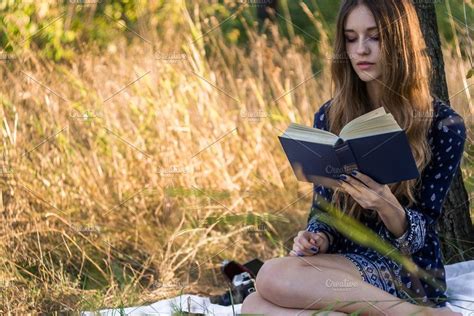 Girl Reading A Book Under A Tree Girl Reading Girl Reading A Book