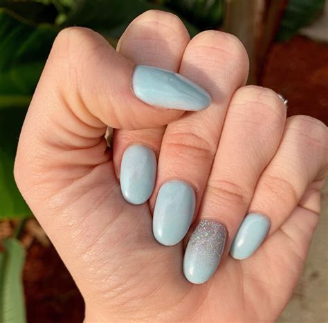 Oval Medium Length Sky Blue Acrylic Nails | Blue acrylic nails, Oval