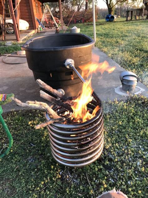 A jacuzzi pump is powered by a motor and circulates the water in the tub through the filter, heater 8. Build this wood fired hot tub today. #outdoorwood ...