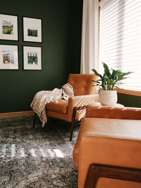 On the hunt for living room paint color ideas? Tips for Decorating a Living Room with Dark, Bold Paint Color - kitty cotten