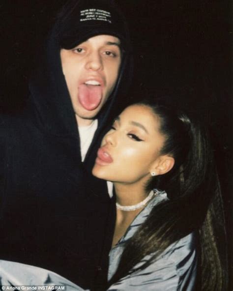Ariana Grande Cuddles Up With Pete Davidson As They Stick Out Tongues
